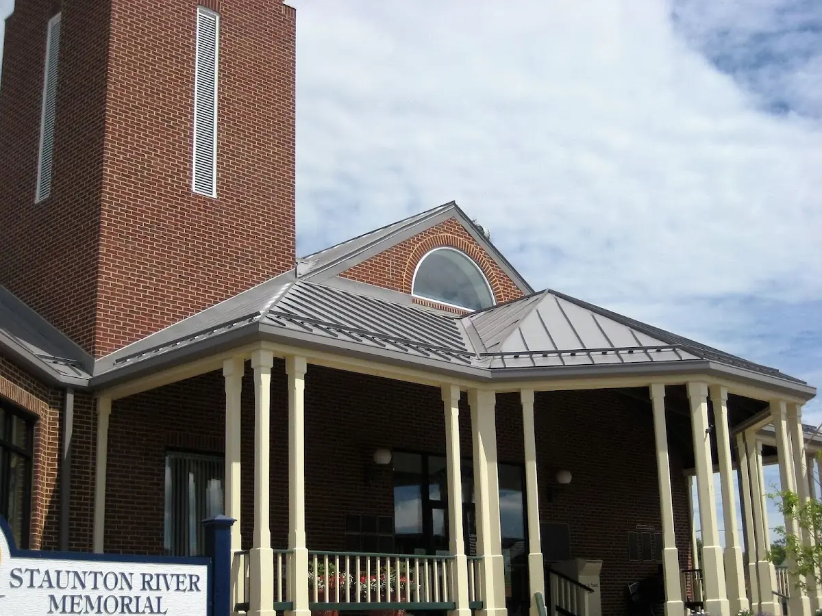 Skilled roofing craftsmen working on a residential roof in Winmore